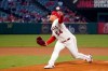 Los Angeles Angels starting pitcher Jose Suarez throws to the plate during the first inning of a baseball game against the Seattle Mariners Friday, Sept. 24, 2021, in Anaheim, Calif. (AP Photo/Mark J. Terrill)