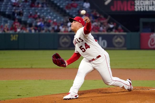 Los Angeles Angels starting pitcher Jose Suarez throws to the plate during the first inning of a baseball game against the Seattle Mariners Friday, Sept. 24, 2021, in Anaheim, Calif. (AP Photo/Mark J. Terrill)