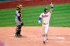 Philadelphia Phillies' Bryce Harper, right, reacts after hitting solo home run off Pittsburgh Pirates starting pitcher Wil Crowe (not shown) during the third inning of a baseball game, Saturday, Sept. 25, 2021, in Philadelphia. (AP Photo/Derik Hamilton)