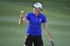 Stacy Lewis waves to fans after sinking her putt on the 9th green during the second round of the LPGA Walmart NW Arkansas Championship golf tournament, Saturday, Sept. 25, 2021, in Rogers, Ark. (AP Photo/Michael Woods)