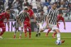 Juventus' Leonardo Bonucci, right, scores on a penalty kick during the Italian Serie A soccer match between Juventus and Sampdoria, in Turin, Italy, Sunday, Sept. 26, 2021. (Marco Alpozzi/LaPresse via AP)