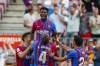 Barcelona's Ansu Fati celebrates after scoring his side's third goal during a Spanish La Liga soccer match between FC Barcelona and Levante at the Camp Nou stadium in Barcelona, Spain, Sunday, Sept. 26, 2021. (AP Photo/Joan Monfort)