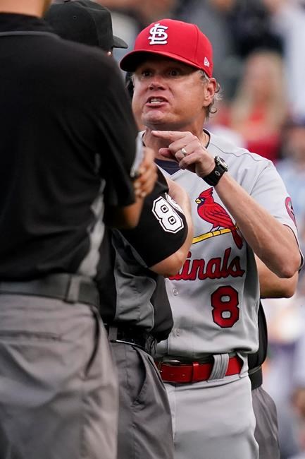 St. Louis Cardinals manager Mike Shildt, right, argues with umpire Doug Eddings during the ninth inning of a baseball game against the Chicago Cubs in Chicago, Sunday, Sept. 26, 2021. Shildt was ejected by umpire Bill Miller. (AP Photo/Nam Y. Huh)