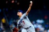 Los Angeles Dodgers starting pitcher Julio Urias throws against the Arizona Diamondbacks during the first inning of a baseball game Sunday, Sept. 26, 2021, in Phoenix. (AP Photo/Ross D. Franklin)