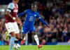 Chelsea's N'Golo Kante, right, controls the ball during the English League Cup third round soccer match between Chelsea and Aston Villa at Stamford Bridge Stadium in London, Wednesday, Sept. 22, 2021. (AP Photo/Frank Augstein)