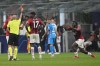 AC Milan's Franck Kessie, right, is shown with the red card during the Champions League group B soccer match between AC Milan and Atletico Madrid at the San Siro stadium in Milan, Italy, Tuesday, Sept. 28, 2021. (AP Photo/Antonio Calanni)