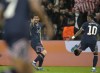 PSG's Lionel Messi celebrates after scoring his side's second goal during the Champions League Group A soccer match between Paris Saint-Germain and Manchester City at the Parc des Princes in Paris, Tuesday, Sept. 28, 2021. (AP Photo/Christophe Ena)