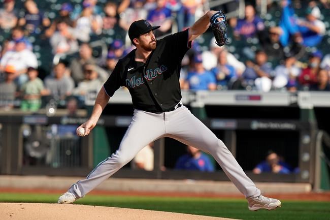 Miami Marlins' Zach Thompson pitches during the first inning in the first baseball game of a doubleheader against the New York Mets, Tuesday, Sept. 28, 2021, in New York. (AP Photo/Frank Franklin II)