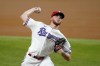 Texas Rangers starting pitcher A.J. Alexy throws to the Los Angeles Angels in the first inning of a baseball game in Arlington, Texas, Tuesday, Sept. 28, 2021. (AP Photo/Tony Gutierrez)