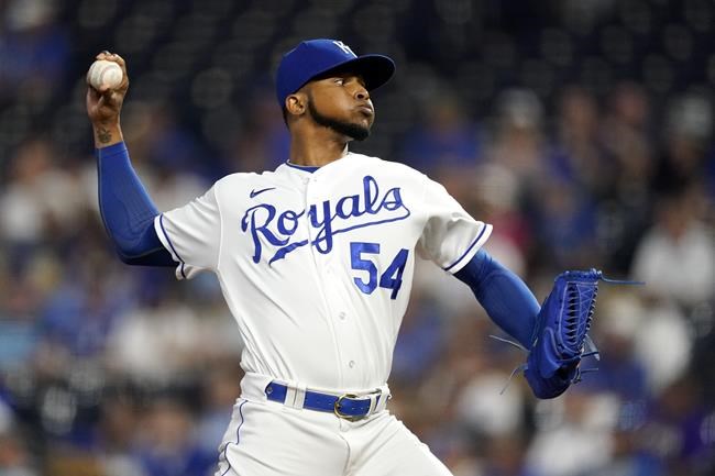 Kansas City Royals relief pitcher Ervin Santana throws during the first inning of a baseball game against the Cleveland Indians Tuesday, Sept. 28, 2021, in Kansas City, Mo. (AP Photo/Charlie Riedel)