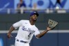 Kansas City Royals center fielder Michael A. Taylor catches a fly for the out on Seattle Mariners' J.P. Crawford during the first inning of a baseball game Friday, Sept. 17, 2021, in Kansas City, Mo. (AP Photo/Charlie Riedel)