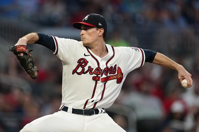 Atlanta Braves starting pitcher Max Fried (54) works against the Philadelphia Phillies in the first inning of a baseball game Wednesday, Sept. 29, 2021, in Atlanta. (AP Photo/John Bazemore)