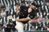 Chicago White Sox starting pitcher Carlos Rodon follows through during the first inning of a baseball game against the Cincinnati Reds Wednesday, Sept. 29, 2021, in Chicago. (AP Photo/Charles Rex Arbogast)