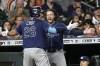 Tampa Bay Rays' Ji-Man Choi (26) celebrates with Brett Phillips after hitting a three-run home run against the Houston Astros during the fifth inning of a baseball game Wednesday, Sept. 29, 2021, in Houston. (AP Photo/David J. Phillip)