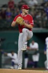 Los Angeles Angels starting pitcher Janson Junk winds up to deliver to the Texas Rangers in the first inning of a baseball game in Arlington, Texas, Wednesday, Sept. 29, 2021. (AP Photo/Tony Gutierrez)