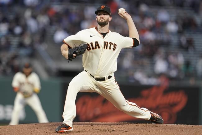 San Francisco Giants' Alex Wood pitches against the Arizona Diamondbacks during the first inning of a baseball game in San Francisco, Wednesday, Sept. 29, 2021. (AP Photo/Jeff Chiu)