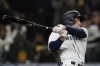 Seattle Mariners' Jarred Kelenic follows through on a two-RBI double against the Oakland Athletics during the sixth inning of a baseball game, Wednesday, Sept. 29, 2021, in Seattle. Mitch Haniger and Ty France scored on the play. (AP Photo/Ted S. Warren)