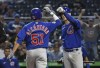 Chicago Cubs Sergio Alcantara (51) is greeted at home by Justin Steele (35) after hitting a two-run home run against the Pittsburgh Pirates during the second inning of a baseball game, Thursday, Sept. 30, 2021 in Pittsburgh.(AP Photo/Philip G. Pavely)