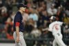 Boston Red Sox starting pitcher Nick Pivetta, left, looks on as Baltimore Orioles' Ryan Mountcastle (6) runs the bases while hitting a three-run home run off him during the third inning of a baseball game, Thursday, Sept. 30, 2021, in Baltimore. (AP Photo/Julio Cortez)