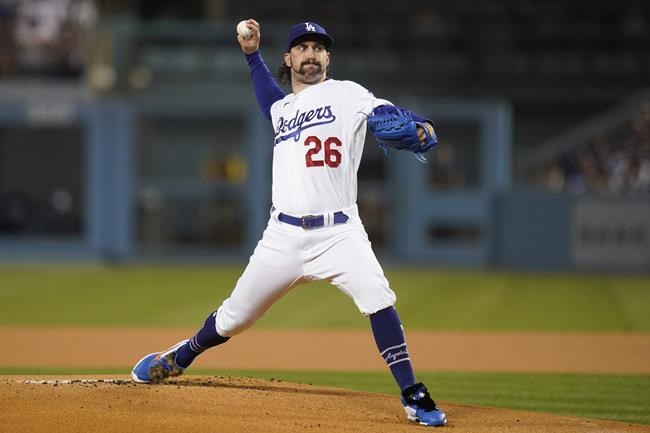 Los Angeles Dodgers starting pitcher Tony Gonsolin (26) throws during the first inning of a baseball game against the San Diego Padres Thursday, Sept. 30, 2021, in Los Angeles. (AP Photo/Ashley Landis)