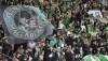 Supporters of Haifa attend a group E Europa Conference League soccer match between 1. FC Union Berlin and Maccabi Haifa FC in Berlin, Germany, Thursday, Sept. 30, 2021. (AP Photo/Michael Sohn)