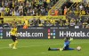 Dortmund's Thorgan Hazard misses to score alone against Augsburg's goalkeeper Rafal Gikiewicz during the German Bundesliga soccer match between Borussia Dortmund and FC Augsburg in Dortmund, Germany, Saturday, Oct. 2, 2021. (AP Photo/Martin Meissner)