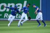 Toronto Blue Jays’, from left, Teoscar Hernandez, Jerrod Dyson and Randal Grichuk celebrate in the outfield after defeating the Baltimore Orioles in an American League baseball game against the Baltimore Orioles in Toronto on Saturday, Oct. 2, 2021. THE CANADIAN PRESS/Jon Blacker
