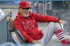 FILE - In this Aug. 6, 2021, file photo, Los Angeles Angels manager Joe Maddon watches from the dugout before a baseball game against the Los Angeles Dodgers in Los Angeles. Joe Maddon is a big believer in the importance of rest. So much so that each year his clubs go through 
