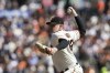San Francisco Giants starting pitcher Logan Webb works against the San Diego Padres in the first inning of a baseball game in San Francisco, Sunday, Oct. 3, 2021. (AP Photo/John Hefti)