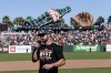 San Francisco Giants manager Gabe Kapler addresses the fans and his team after they defeated the San Diego Padres in a baseball game in San Francisco, Sunday, Oct. 3, 2021. The Giants won the National League West title. (AP Photo/John Hefti)
