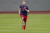 Boston Red Sox pitcher Chris Sale runs in the outfield at the American League Wild Card Workout Day at Fenway Park, Monday, Oct. 4, 2021, before Tuesday's American League Wild Card game against the New York Yankees in Boston. (AP Photo/Mary Schwalm)