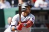 Minnesota Twins' Jorge Polanco watches his three-run home run during the first inning of a baseball game against the Kansas City Royals in Kansas City, Mo., Sunday, Oct. 3, 2021. (AP Photo/Colin E. Braley)