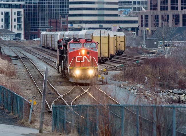 A CN Rail locomotive moves through the rail yard in Dartmouth, N.S. on Thursday, March 29, 2018. The proxy battle between Canadian National Railway Co. and a leading shareholder has heated up with TCF Fund Management Ltd. defending itself from accusations of conflict of interest. THE CANADIAN PRESS/Andrew Vaughan