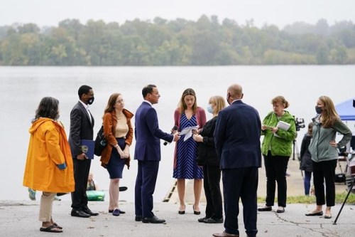 Pennsylvania Attorney General Josh Shapiro, center left, meets with members of the public and the press after a news conference at Marsh Creek State Park in Downingtown, Pa., Tuesday, Oct. 5, 2021. Shapiro filed criminal charges Tuesday against the developer of a problem-plagued pipeline that takes natural gas liquids from the Marcellus Shale gas field to an export terminal near Philadelphia. (AP Photo/Matt Rourke)