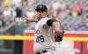 Colorado Rockies pitcher Antonio Senzatela (49) delivers against the Arizona Diamondbacks during the first inning of a baseball game, Saturday, Oct 2, 2021, in Phoenix. (AP Photo/Darryl Webb)
