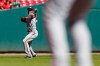Washington Nationals' Alcides Escobar throws a runner out at first base during the second inning of a baseball game against the Cincinnati Reds, Sunday, Sept. 26, 2021, in Cincinnati. (AP Photo/Jay LaPrete)