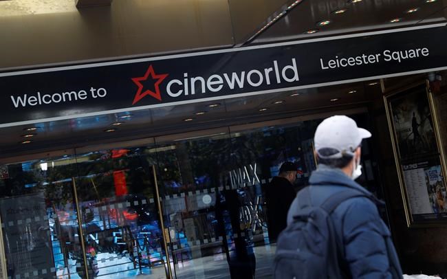 A man walks past a Cineworld cinema in Leicester Square, London, Monday, Oct. 5, 2020. THE CANADIAN PRESS/AP/Alastair Grant