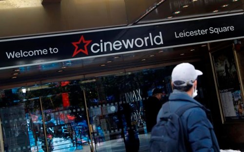 A man walks past a Cineworld cinema in Leicester Square, London, Monday, Oct. 5, 2020. THE CANADIAN PRESS/AP/Alastair Grant