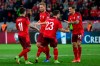 Switzerland's Steven Zuber, right, celebrates scoring with teammates Xherdan Shaqiri, 2nd right, Renato Steffen, left, and Nico Elvedi, 2nd left, during the World Cup 2022 group I qualifying soccer match between Switzerland and Northern Ireland, at the Stade de Geneve stadium, in Geneva, Switzerland, Saturday, Oct. 9, 2021. (Salvatore Di Nolfi/Keystone via AP)