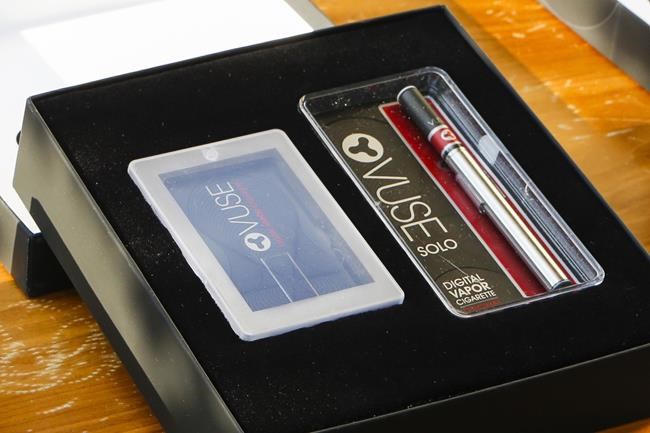 FILE - This Wednesday, June 18, 2014 file photo shows VUSE Digital Vapor Cigarette packaging during a launch event held by R.J. Reynolds Vapor Company in Philadelphia. On Tuesday, Oct. 12, 2021, heath officials authorized the first electronic cigarettes in the U.S., saying R.J. Reynolds vaping products can benefit adult smokers. (Mark Stehle/AP Images for R.J. Reynolds Vapor Company, File)