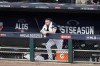 Chicago White Sox relief pitcher Liam Hendriks watches the Houston Astros celebrate winning 10-1 after Game 4 of a baseball American League Division Series Tuesday, Oct. 12, 2021, in Chicago. (AP Photo/Charles Rex Arbogast)