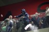A Polish fan throws a bottle to Albanian supporters during the World Cup 2022 group I qualifying soccer match between Albania and Poland at Air Albania stadium in Tirana, Albania, Tuesday, Oct. 12, 2021. Poland won 1-0. (AP Photo/Franc Zhurda)