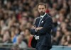 England's manager Gareth Southgate watches play during the World Cup 2022 group I qualifying soccer match between England and Hungary at Wembley stadium in London, Tuesday, Oct. 12, 2021. (AP Photo/Kirsty Wigglesworth)