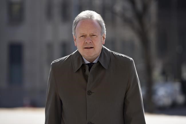 Stephen Poloz arrives before a press conference on economic support for Canadians impacted by COVID-19, at West Block on Parliament Hill in Ottawa, on Wednesday, March 18, 2020. THE CANADIAN PRESS/Justin Tang