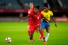 Canada's Kadeisha Buchanan, left, and Britain's Rachel Daly battle for the ball during a women's quarterfinal soccer match at the 2020 Summer Olympics, Friday, July 30, 2021, in Rifu, Japan. Canadian defender Kadeisha Buchanan scored twice Thursday in Lyon's 5-0 win over Portugal's Benfica in UEFA Women's Champions League Group D play Thursday.THE CANADIAN PRESS/AP, Andre Penner