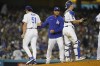 Los Angeles Dodgers pitcher Alex Vesia (51) is pulled by manager Dave Roberts, center, during the seventh inning of Game 4 of the baseball team's National League Division Series against the San Francisco Giants, Tuesday, Oct. 12, 2021, in Los Angeles. (AP Photo/Ashley Landis)