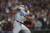 Los Angeles Dodgers pitcher Max Scherzer celebrates after the Dodgers defeated the San Francisco Giants in Game 5 of a baseball National League Division Series Thursday, Oct. 14, 2021, in San Francisco. (AP Photo/John Hefti)