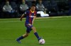 FILE - In this Oct. 20, 2020 file photo, Barcelona's Pedri controls the ball during the Champions League group G soccer match between FC Barcelona and Ferencvaros at the Camp Nou stadium in Barcelona. Barcelona has re-signed Pedri Gonzalez to a new contract through the 2025-26 season. The 18-year-old midfielder is one of the few bright spots in an otherwise tumultuous period for the Spanish club. (AP Photo/Joan Monfort)