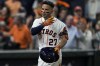 Houston Astros' Jose Altuve celebrates after a two-run home run against the Boston Red Sox during the sixth inning in Game 1 of baseball's American League Championship Series Friday, Oct. 15, 2021, in Houston. (AP Photo/David J. Phillip)