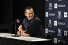 New York Yankees manager Aaron Boone laughs before answering a question during a news conference at the American League Wild Card Workout Day at Fenway Park, Monday, Oct. 4, 2021, before Tuesday's American League Wild Card game against the Boston Red Sox in Boston. (AP Photo/Mary Schwalm)